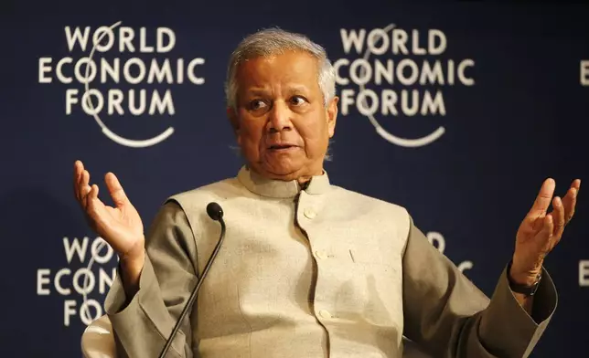 FILE- Nobel Peace Laureate Muhammad Yunus, Chairman of the Yunus Centre, speaks during a debate hosted by the Associated Press "Regions in Transformation: South Asia" at the World Economic Forum in Davos, Switzerland, Thursday, Jan. 21, 2016. (AP Photo/Michel Euler, File)