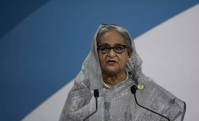 FILE- Prime Minister of Bangladesh Sheikh Hasina delivers a speech during the Paris Peace Forum, in Paris, Thursday, Nov. 11, 2021. Protesters stormed Hasina’s official residence on Monday, Aug. 5, 2024, as leader’s whereabouts are unknown. (AP Photo/Christophe Ena, File)