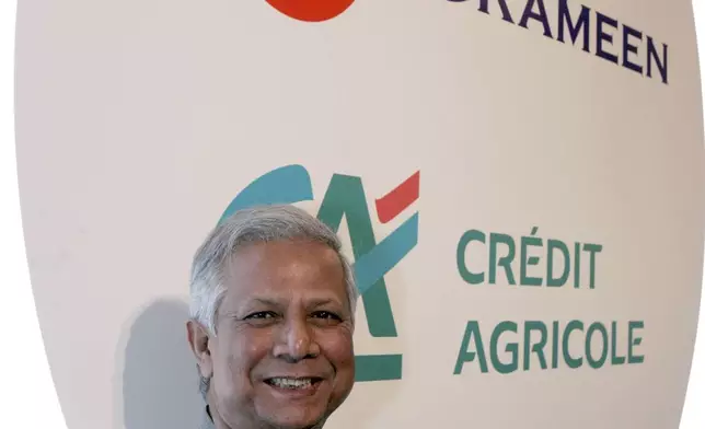 FILE- Muhammad Yunus, an economist from Bangladesh who founded the Grameen Bank and won a Nobel Peace Prize, is seen at the end of a press conference in Paris Monday Feb. 18, 2008. (AP Photo/Remy de la Mauviniere, File)