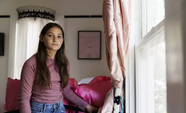 Scarlett Goddard Strahan, 11, poses for a portrait at her home on Tuesday, Aug. 20, 2024, in Sacramento, Calif. (AP Photo/Juliana Yamada)