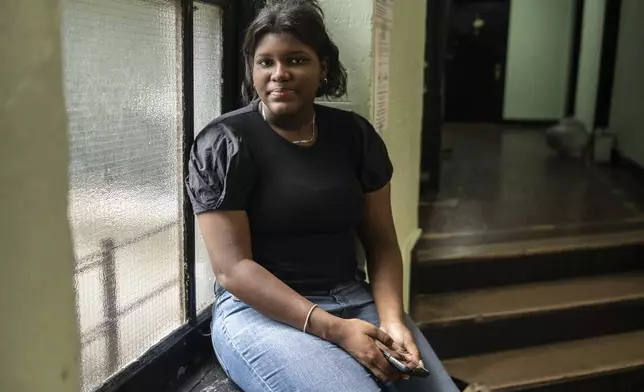 Mia Hall, 14, poses for a portrait in her neighborhood park on Thursday, Aug. 29, 2024, in Bronx borough of New York. (AP Photo/Brittainy Newman)