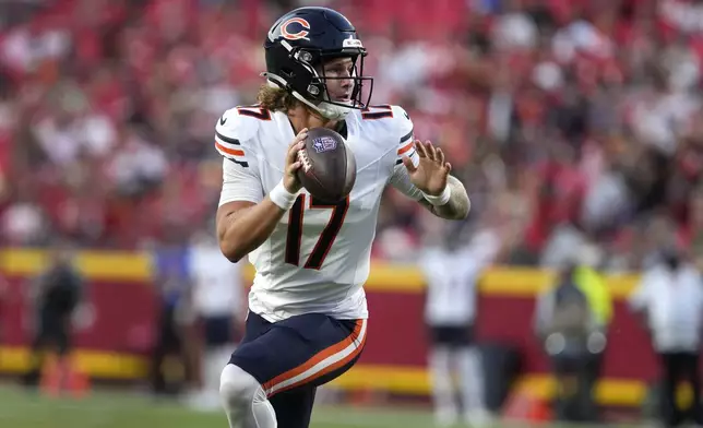 Chicago Bears quarterback Tyson Bagent scores on a touchdown run during the first half of an NFL preseason football game against the Kansas City Chiefs Thursday, Aug. 22, 2024, in Kansas City, Mo. (AP Photo/Ed Zurga)