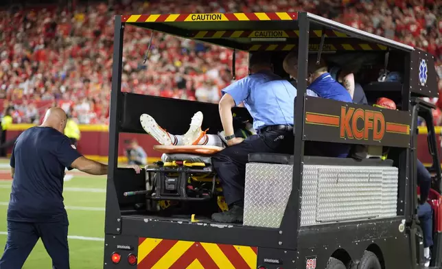 Chicago Bears defensive back Douglas Coleman III is taken off the field on a cart after being injured during the second half of an NFL preseason football game against the Kansas City Chiefs Thursday, Aug. 22, 2024, in Kansas City, Mo. (AP Photo/Charlie Riedel)