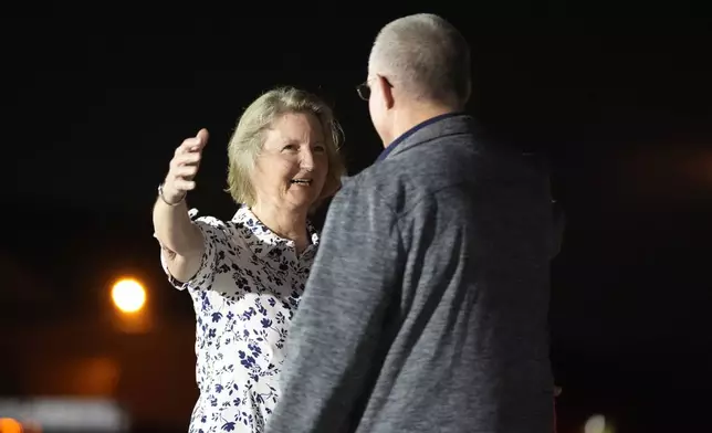 Elizabeth Whelan, left, greets her brother Paul Whelan at Andrews Air Force Base, Md., following his release as part of a 24-person prisoner swap between Russia and the United States, Thursday, Aug. 1, 2024. (AP Photo/Alex Brandon)