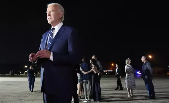 President Joe Biden speaks after greeting reporter Evan Gershkovich, Alsu Kurmasheva and Paul Whelan at Andrews Air Force Base, Md., following their release as part of a 24-person prisoner swap between Russia and the United States, Thursday, Aug. 1, 2024. (AP Photo/Alex Brandon)