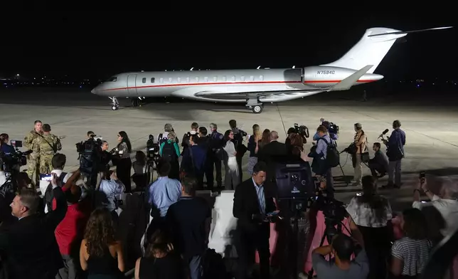 A plane carrying reporter Evan Gershkovich, Alsu Kurmasheva and Paul Whelan arrives at Andrews Air Force Base, Md., following their release as part of a 24-person prisoner swap between Russia and the United States, Thursday, Aug. 1, 2024. (AP Photo/Manuel Balce Ceneta)