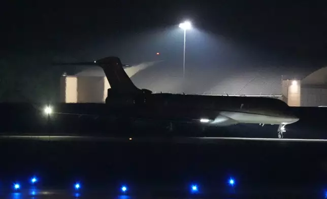 A plane carrying reporter Evan Gershkovich, Alsu Kurmasheva and Paul Whelan lands at Andrews Air Force Base, Md., following their release as part of a 24-person prisoner swap between Russia and the United States, Thursday, Aug. 1, 2024. (AP Photo/Alex Brandon)