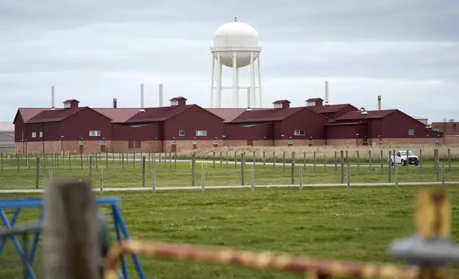 A large animal containment building is seen on the campus of the U.S. Department of Agriculture's National Animal Disease Center research facility in Ames, Iowa, on Tuesday, Aug. 6, 2024. (AP Photo/Charlie Neibergall)