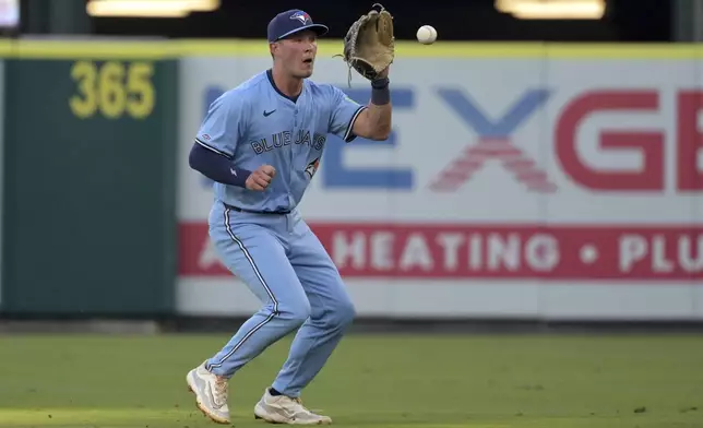 Toronto Blue Jays' Will Wagner makes a play at second base during the second inning of a baseball game against the Los Angeles Angels, Monday, Aug. 12, 2024, in Anaheim, Calif. (AP Photo/Jayne-Kamin-Oncea)