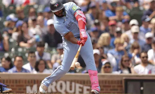 Toronto Blue Jays' Vladimir Guerrero Jr. grounds out during the third inning of a baseball game against the Chicago Cubs, Sunday, Aug. 18, 2024, in Chicago. (AP Photo/Melissa Tamez)