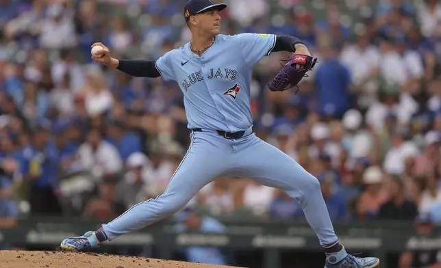 Toronto Blue Jays starting pitcher Bowden Francis throws during the first inning of a baseball game against the Chicago Cubs, Sunday, Aug. 18, 2024, in Chicago. (AP Photo/Melissa Tamez)