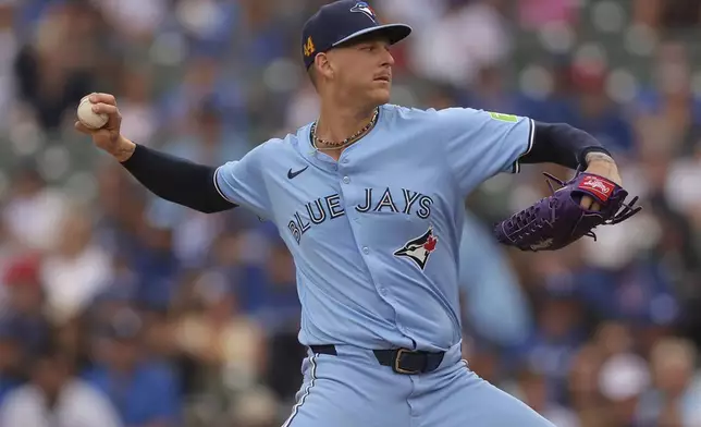 Toronto Blue Jays starting pitcher Bowden Francis throws during the first inning of a baseball game against the Chicago Cubs, Sunday, Aug. 18, 2024, in Chicago. (AP Photo/Melissa Tamez)