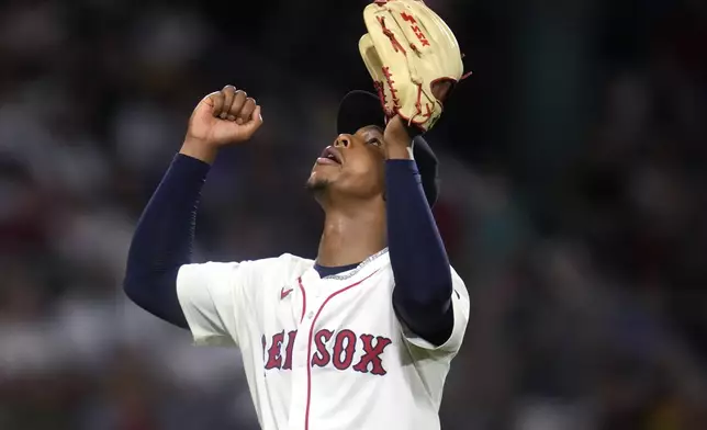 Boston Red Sox pitcher Brayan Bello celebrates after Toronto Blue Jays' Addison Barger grounded out to end the top of the seventh inning of a baseball game at Fenway Park, Wednesday, Aug. 28, 2024, in Boston. (AP Photo/Charles Krupa)