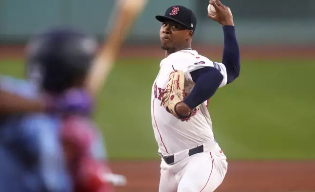 Boston Red Sox pitcher Brayan Bello delivers during the first inning of a baseball game against the Toronto Blue Jays at Fenway Park, Wednesday, Aug. 28, 2024, in Boston. (AP Photo/Charles Krupa)