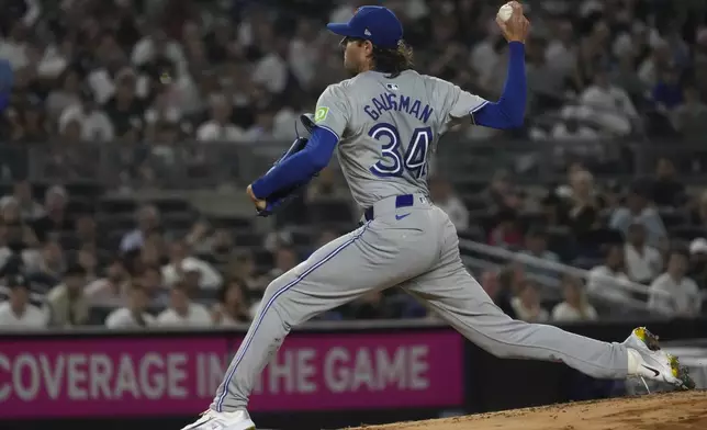 Toronto Blue Jays' Kevin Gausman pitches during the first inning of a baseball game against the New York Yankees, Friday, Aug. 2, 2024, in New York. (AP Photo/Pamela Smith)