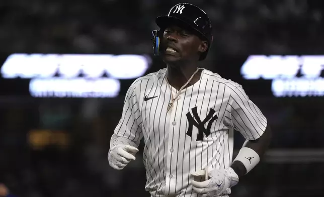 New York Yankees' Jazz Chisholm Jr. reacts after flying out during the second inning of a baseball game against the Toronto Blue Jays, Friday, Aug. 2, 2024, in New York. (AP Photo/Pamela Smith)