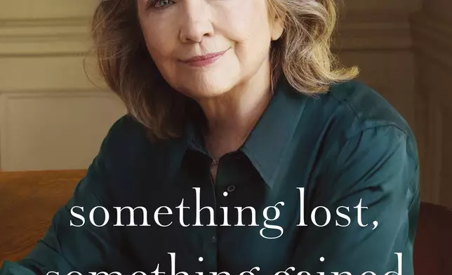 This cover image released by Simon &amp; Schuster shows "Something Lost, Something Gained: Reflections on Life, Love and Liberty" by Hillary Rodham Clinton. The book will be released Sept. 17. (Simon &amp; Schuster via AP)