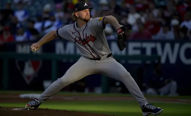 Atlanta Braves' Spencer Schwellenbach delivers to the plate during the first inning of a baseball game against the Los Angeles Angels, Friday, Aug. 16, 2024, in Anaheim, Calif. (AP Photo/Jayne Kamin-Oncea)