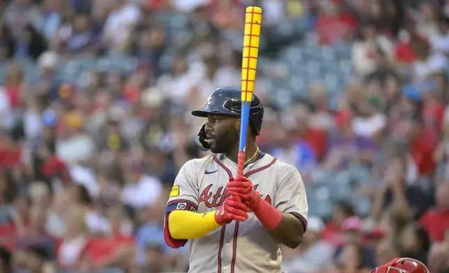 Atlanta Braves' Marcell Ozuna uses a custom-painted bat on Players' Weekend in the third inning of a baseball game against the Los Angeles Angels, Friday, Aug. 16, 2024, in Anaheim, Calif. (AP Photo/Jayne Kamin-Oncea)