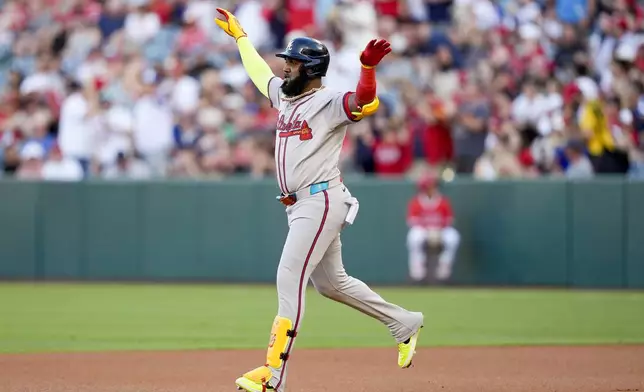 Atlanta Braves designated hitter Marcell Ozuna celebrates after hitting a three-run home run during the first inning of a baseball game against the Los Angeles Angels, Saturday, Aug. 17, 2024, in Anaheim, Calif. (AP Photo/Ryan Sun)