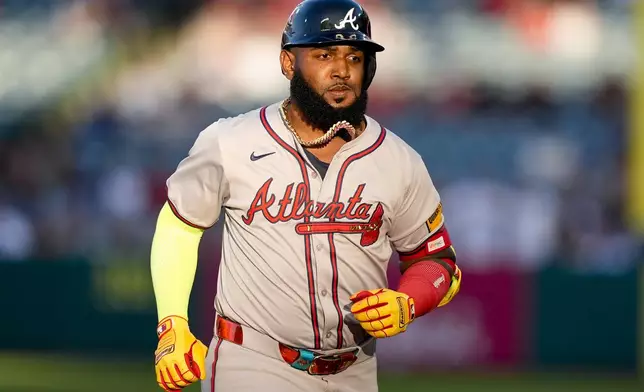 Atlanta Braves designated hitter Marcell Ozuna runs the bases after hitting a three-run home run during the first inning of a baseball game against the Los Angeles Angels, Saturday, Aug. 17, 2024, in Anaheim, Calif. (AP Photo/Ryan Sun)