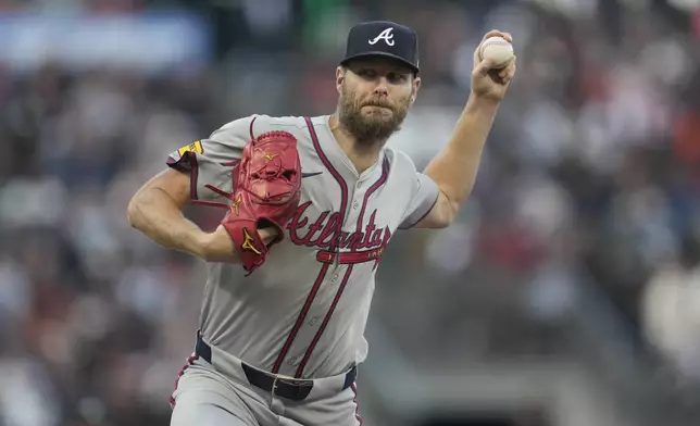 Atlanta Braves pitcher Chris Sale works against the San Francisco Giants during the first inning of a baseball game in San Francisco, Monday, Aug. 12, 2024. (AP Photo/Jeff Chiu)