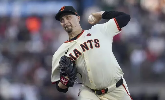 San Francisco Giants pitcher Blake Snell works against the Atlanta Braves during the first inning of a baseball game in San Francisco, Monday, Aug. 12, 2024. (AP Photo/Jeff Chiu)