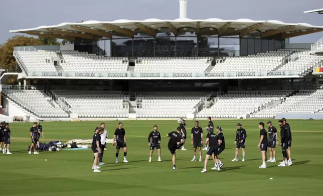 England players warm up playing football during a nets session at Lord's, in London, Tuesday, Aug. 27, 2024, ahead of their test cricket match against Sri Lanka on Thursday. (Steven Paston/PA via AP)