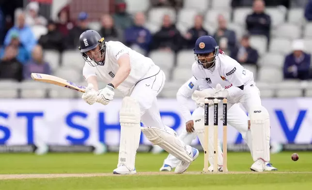 England's Dan Lawrence bats on day one of the First Test match between England and Sri Lanka at Emirates Old Trafford, Manchester, England, Wednesday Aug. 21, 2024. (Nick Potts/PA via AP)