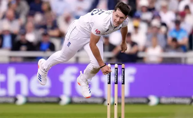 England's Matthew Potts bowls on day one of the First Test match between England and Sri Lanka at Emirates Old Trafford, Manchester, England, Wednesday Aug. 21, 2024. (Nick Potts/PA via AP)