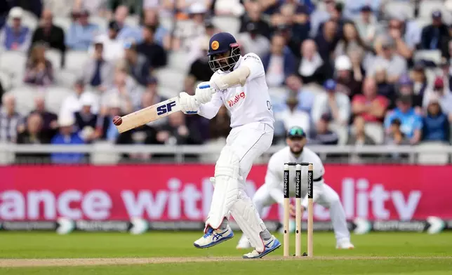 Sri Lanka's Dhananjaya de Silva bats on day one of the First Test match between England and Sri Lanka at Emirates Old Trafford, Manchester, England, Wednesday Aug. 21, 2024. (Nick Potts/PA via AP)