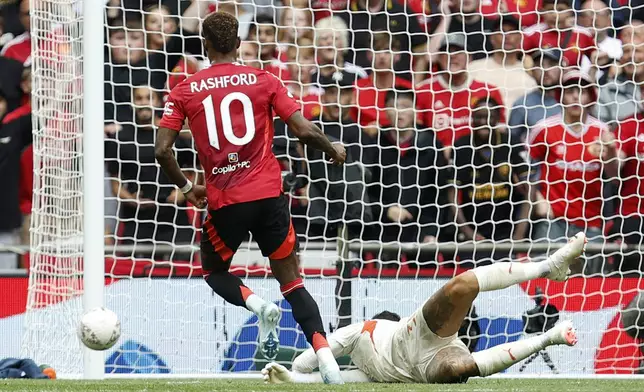 Manchester United forward Marcus Rashford fails to score during the FA Community Shield soccer match between Manchester City and Manchester United at Wembley Stadium in London, Saturday, Aug. 10, 2024. (AP Photo/David Cliff)