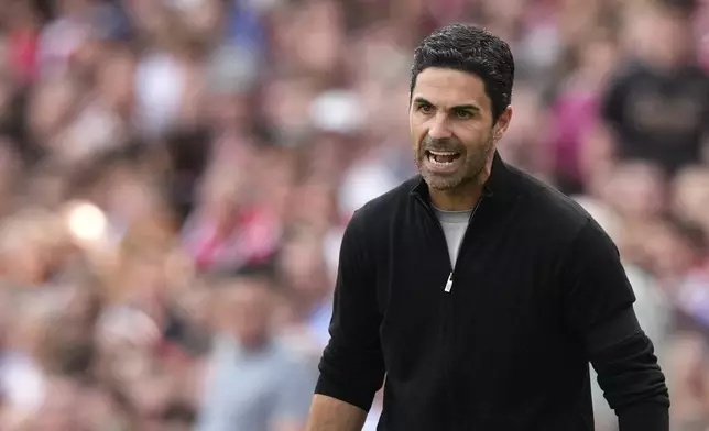 Arsenal's manager Mikel Arteta reacts during the English Premier League soccer match between Arsenal and Wolverhampton Wanderers at Emirates Stadium in London, England, Saturday, Aug. 17, 2024. (AP Photo/Frank Augstein)