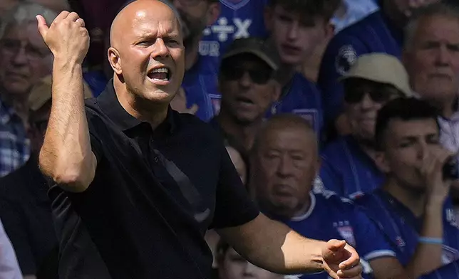 Liverpool's manager Arne Slot gestures during the English Premier League soccer match between Ipswich Town and Liverpool at Portman Road stadium in Ipswich, England, Saturday, Aug. 17, 2024. (AP Photo/Alastair Grant)