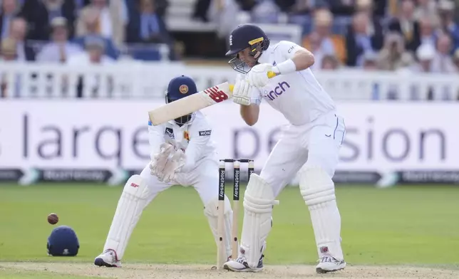 England's Joe Root bats during day one of the second Test cricket match between England and Sri Lanka, at Lord's, in London, Thursday, Aug. 29, 2024. (John Walton/PA via AP)