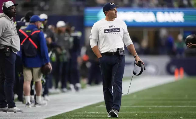 Seattle Seahawks head coach Mike Macdonald looks on during the first half of a preseason NFL football game against the Cleveland Browns, Saturday, Aug. 24, 2024, in Seattle. (AP Photo/Lindsey Wasson)