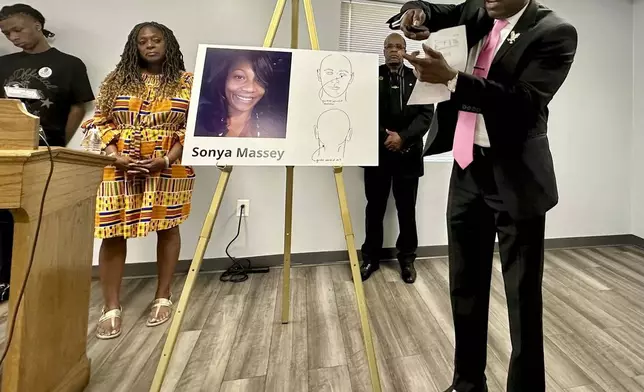 CORRECTS TO PLEADED NOT GUILTY Ben Crump, the civil rights attorney representing the family of Sonya Massey, stands next to a diagram from the slain woman's autopsy on Friday, June 26, 2024, in Springfield, Ill., and gestures to show the downward angle in which Sangamon County Sheriff's Deputy Sean Grayson shot Massey in the face early on July 6. Massey had called 911 with suspicions of a prowler near her Springfield home. Grayson has pleaded not guilty to first-degree murder and other charges. (AP Photo/John O'Connor)