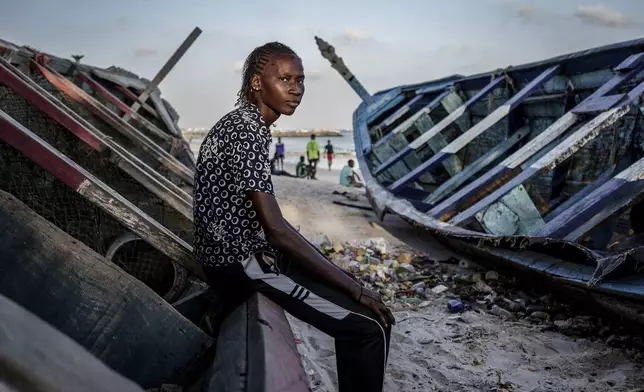 CORRECTS FAMILY NAME TO NDIAYE - Salamba Ndiaye, a 28-year-old who tried to migrate to Europe twice, poses for a photo at the beach in Thiaroye-Sur-Mer, Senegal, Friday, Aug. 23, 2024. Ndiaye is one of thousands of young Senegalese who try to flee poverty and the lack of job opportunities in the West African country each year to head to Spain. More than 22,300 people have landed on the Canary Islands from January to mid-August this year. (AP Photo/Annika Hammerschlag)