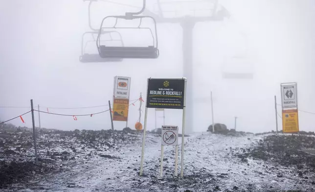 A coat of snow covers ski lifts on Mount Bachelor Friday, Aug. 23, 2024, in Bend, Ore. (Garrett Lockrem/Mount Bachelor Ski Resort via AP)