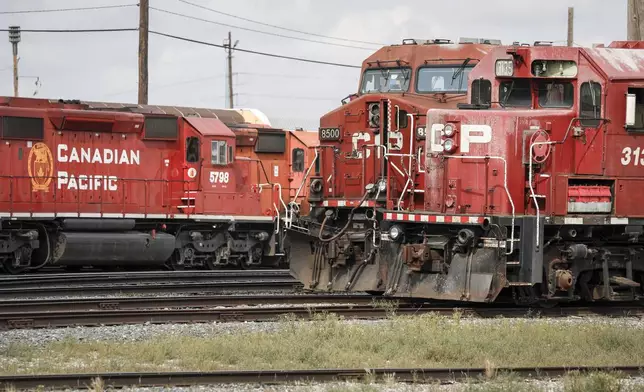 Locomotives sit idol at the CPKC rail yard in Calgary, Alta., Thursday, Aug. 22, 2024.(Jeff McIntosh /The Canadian Press via AP)