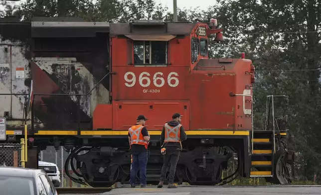 A locomotive is moved by management at Canadian National Rail's Thornton Yard in Surrey, British Columbia, Canada, Thursday, Aug. 22, 2024. (Darryl Dyck/The Canadian Press via AP)