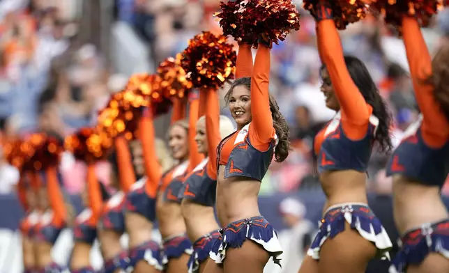 The Denver Broncos cheerleaders perform during the second half of a preseason NFL football game against the Arizona Cardinals, Sunday, Aug. 25, 2024, in Denver. (AP Photo/Jack Dempsey)