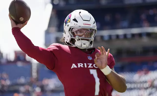 Arizona Cardinals quarterback Kyler Murray warms up prior to a preseason NFL football game against the Denver Broncos, Sunday, Aug. 25, 2024, in Denver. (AP Photo/Jack Dempsey)