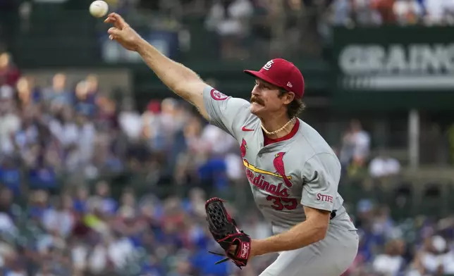 St. Louis Cardinals starting pitcher Miles Mikolas throws against the Chicago Cubs during the first inning of a baseball game in Chicago, Sunday, Aug. 4, 2024. (AP Photo/Nam Y. Huh)