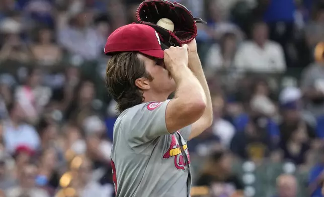 St. Louis Cardinals starting pitcher Miles Mikolas reacts after Chicago Cubs' Pete Crow-Armstrong hit a double during the second inning of a baseball game in Chicago, Sunday, Aug. 4, 2024. (AP Photo/Nam Y. Huh)