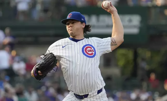 Chicago Cubs starting pitcher Justin Steele throws against the St. Louis Cardinals during the first inning of a baseball game in Chicago, Sunday, Aug. 4, 2024. (AP Photo/Nam Y. Huh)