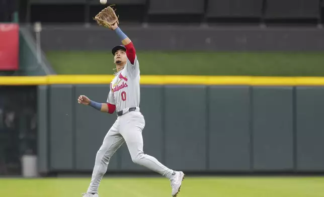 St. Louis Cardinals' Masyn Winn catches a line drive during the second inning of a baseball game against the Cincinnati Reds, Tuesday, Aug. 13, 2024, in Cincinnati. (AP Photo/Kareem Elgazzar)