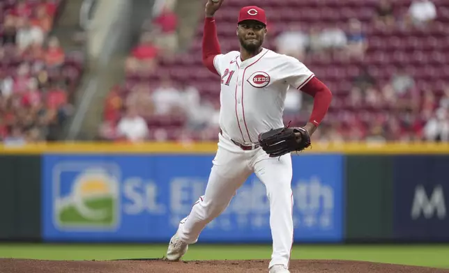 Cincinnati Reds' Hunter Greene delivers a pitch during the first inning of a baseball game against the St. Louis Cardinals, Tuesday, Aug. 13, 2024, in Cincinnati. (AP Photo/Kareem Elgazzar)