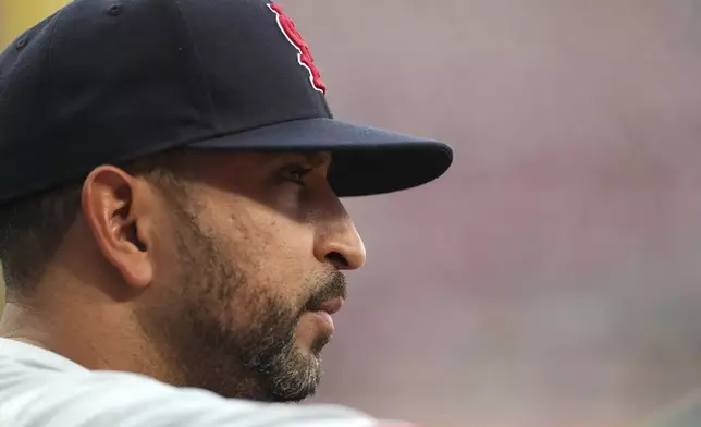 St. Louis Cardinals manager Oliver Marmol watches play during the third inning of a baseball game against the Cincinnati Reds, Tuesday, Aug. 13, 2024, in Cincinnati. (AP Photo/Kareem Elgazzar)