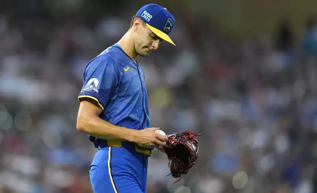 Minnesota Twins starting pitcher David Festa stands on the mound after an RBI single by St. Louis Cardinals' Masyn Winn during the third inning of a baseball game Friday, Aug. 23, 2024, in Minneapolis. (AP Photo/Abbie Parr)